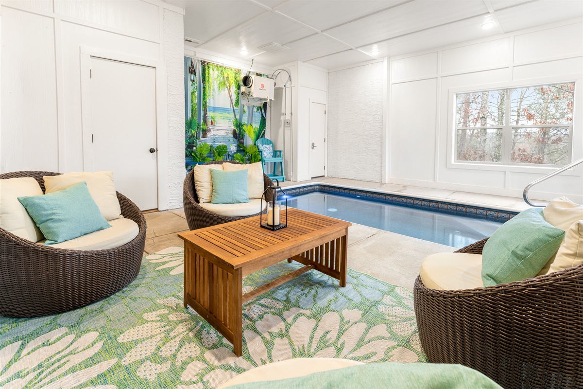 [Pool Room] Bright lounge chairs add a pop of color and a fun place to relax by the pool.