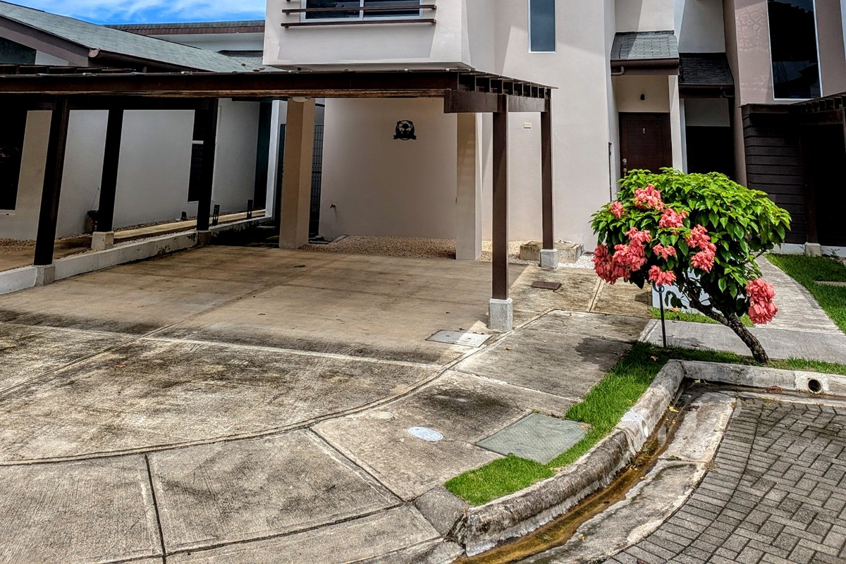 Front view of the home with two parking spots