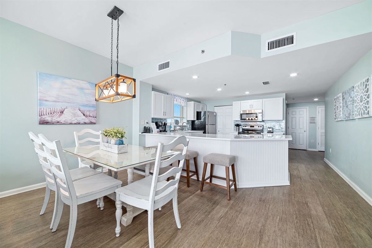 Gather, eat, and make memories. Our spacious dining area and adjacent breakfast bar provide plenty of room for guests to enjoy meals and conversations, creating the perfect setting for your vacation.