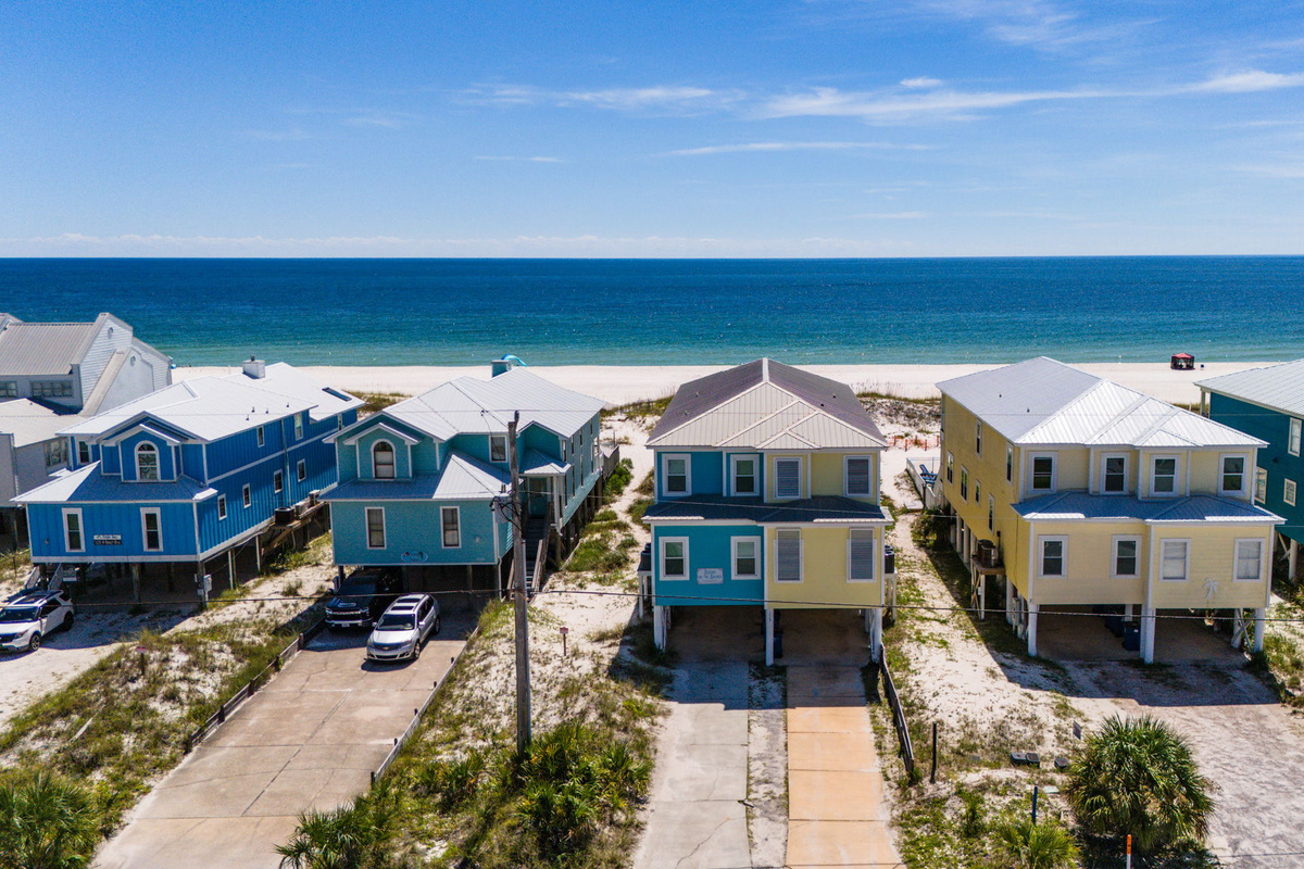 Welcome to the Blue Side, our vacation rental in a charming coastal community just steps from the beach.