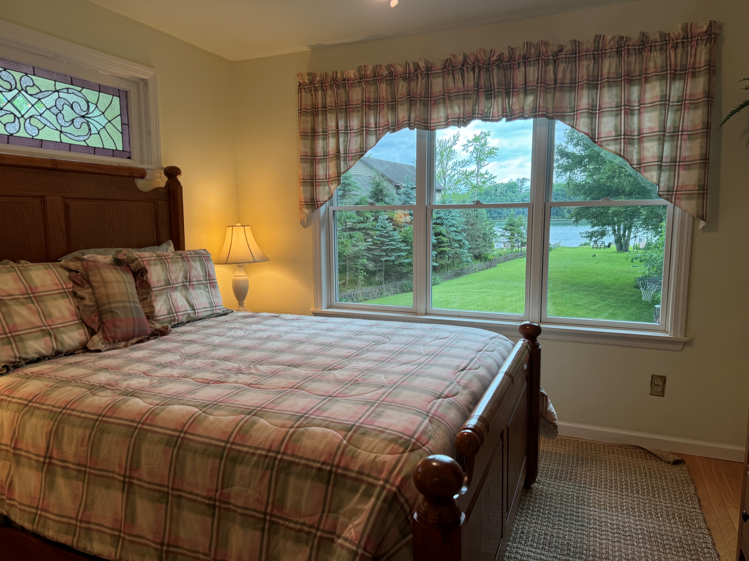 Main level Master suite with wonderful views of the lake!