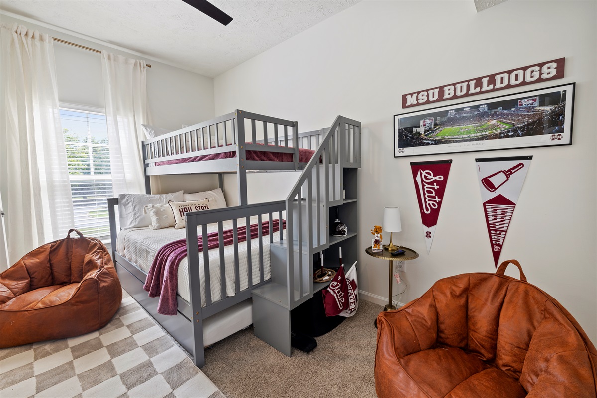 Fun bunk room featuring a twin-over-full bed plus trundle for extra sleeping space.
