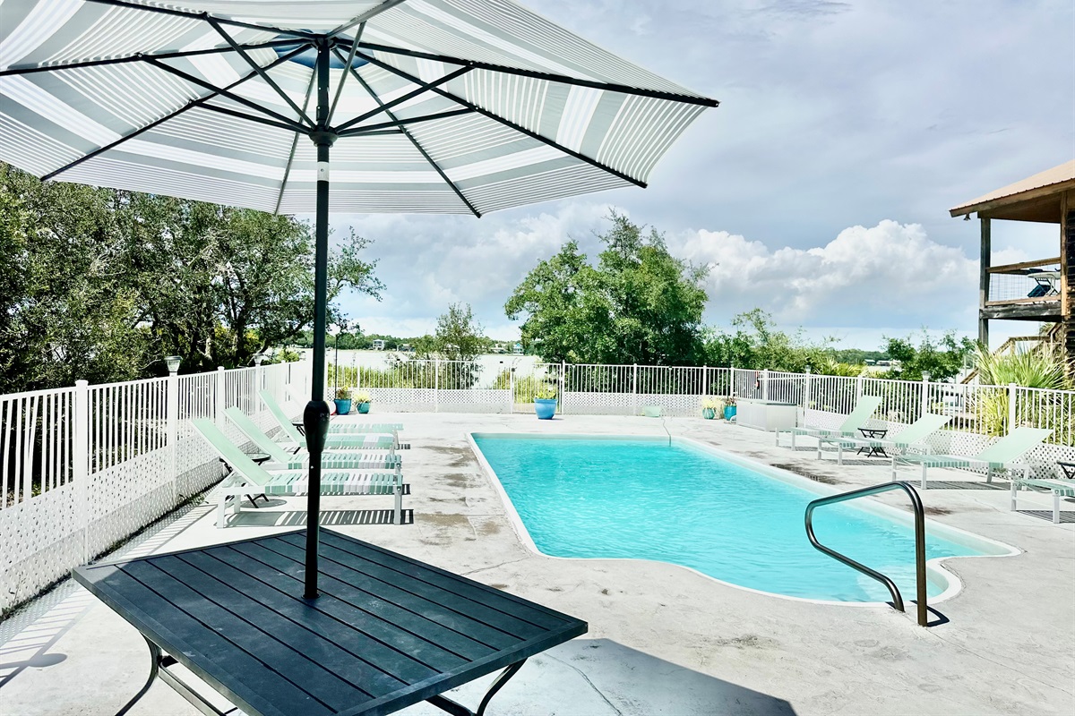The pool is shared with the owners of the East side duplex.