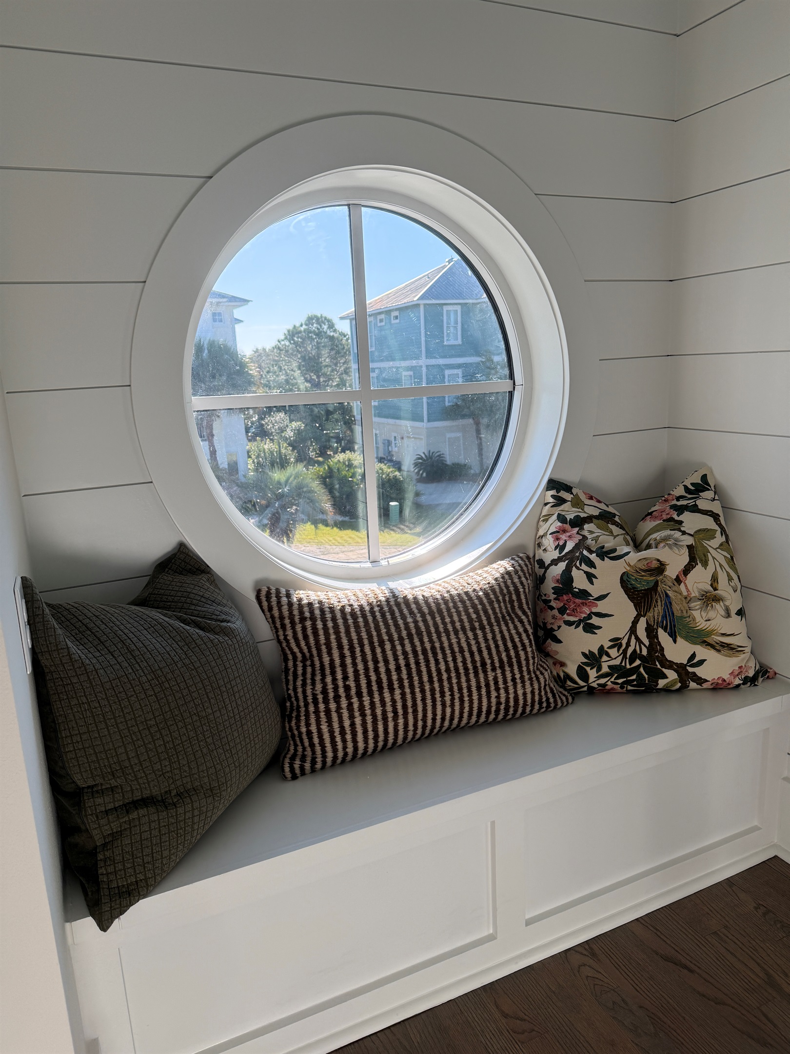 A cozy porthole perch—perfect for a quiet moment.  Gather when you want to, retreat when you need to. From porch swings and reading nooks to private bedrooms and loft hideaways, Magnolia Mooring offers a place for everyone.