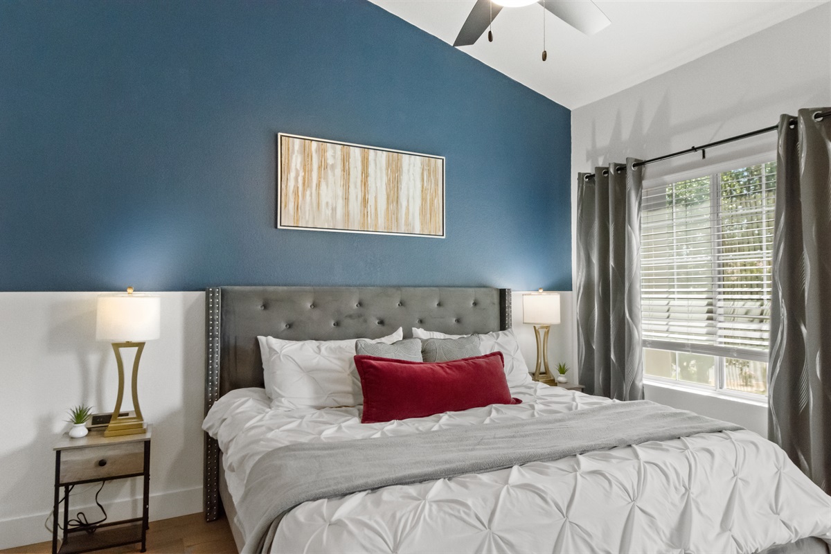 Clean and welcoming bedroom with thoughtful touches