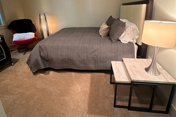 Queen bedroom on the second floor, featuring convenient access to the Jack and Jill bathroom.
