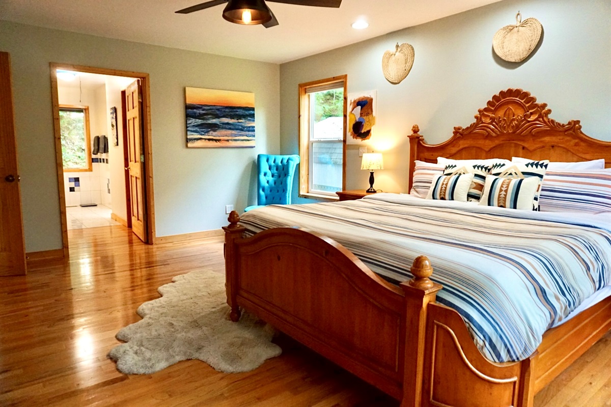 Bedroom Retreat: Embrace serene mornings in a spacious haven adorned with rustic charm!