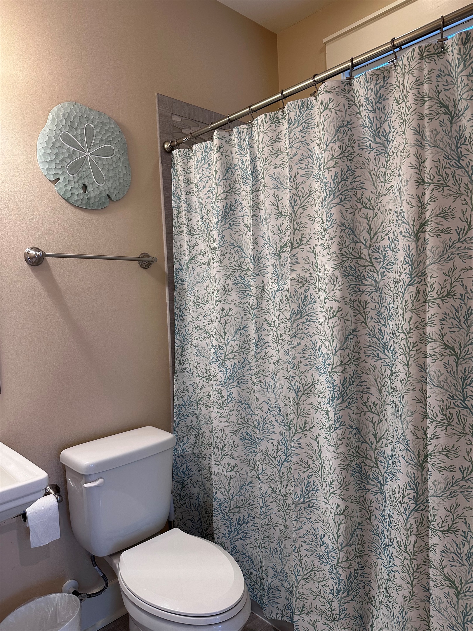 En suite bath #2 upstairs at top of stairs with tub/shower combo.
