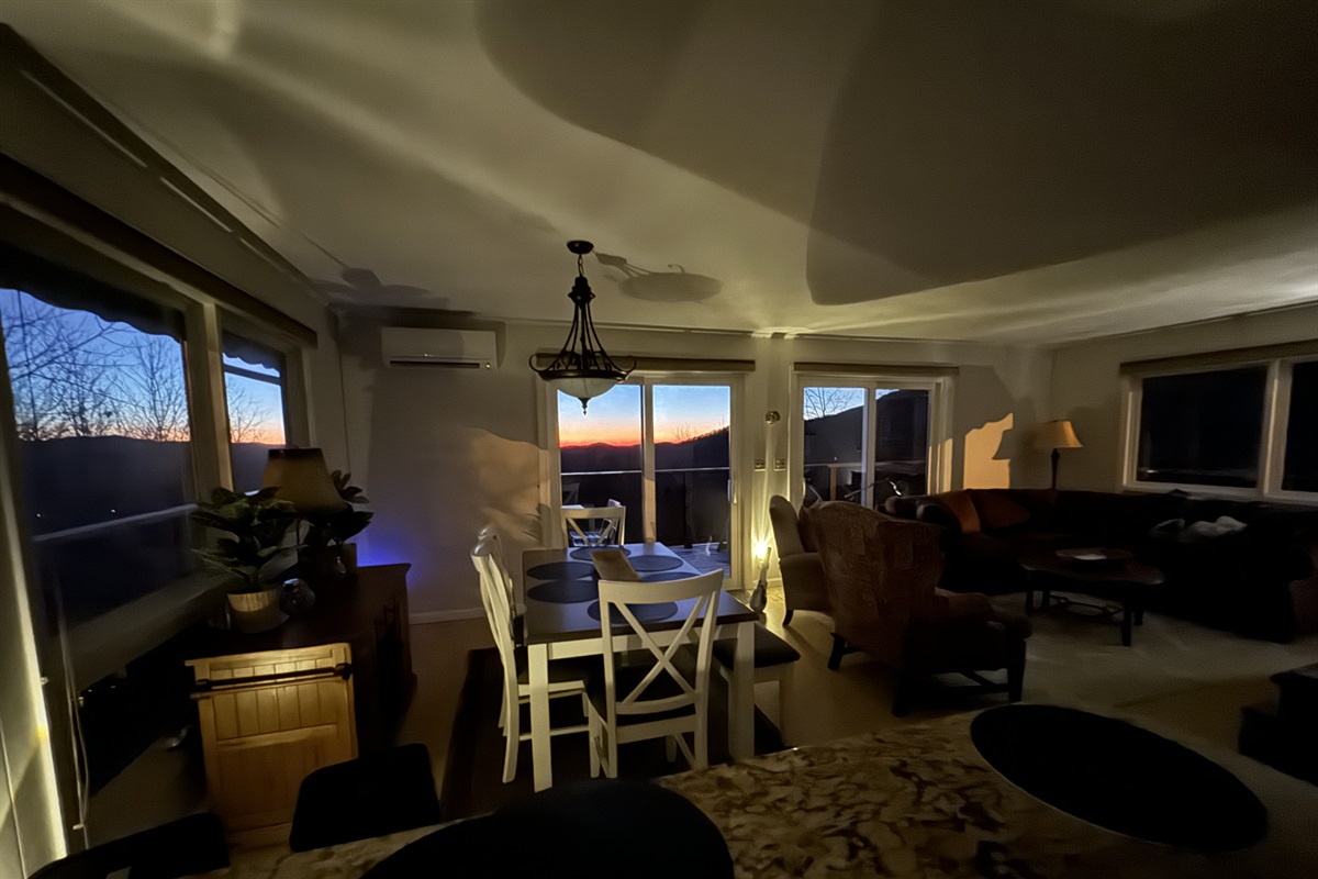 Dining with amazing views! Our dining table seats 6 (with 4 chairs + 1 bench that seats 2 more) & 4 barstools that are adjacent to this table, under the kitchen counter bar to seat 10 total.