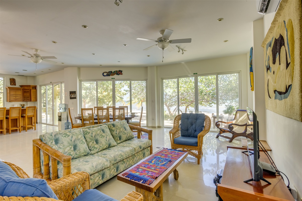 Living room with pool and beach view
