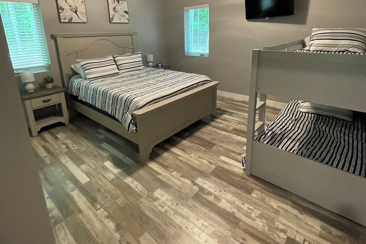 House 2 - bedroom 3 with queen bed and twin bunk beds