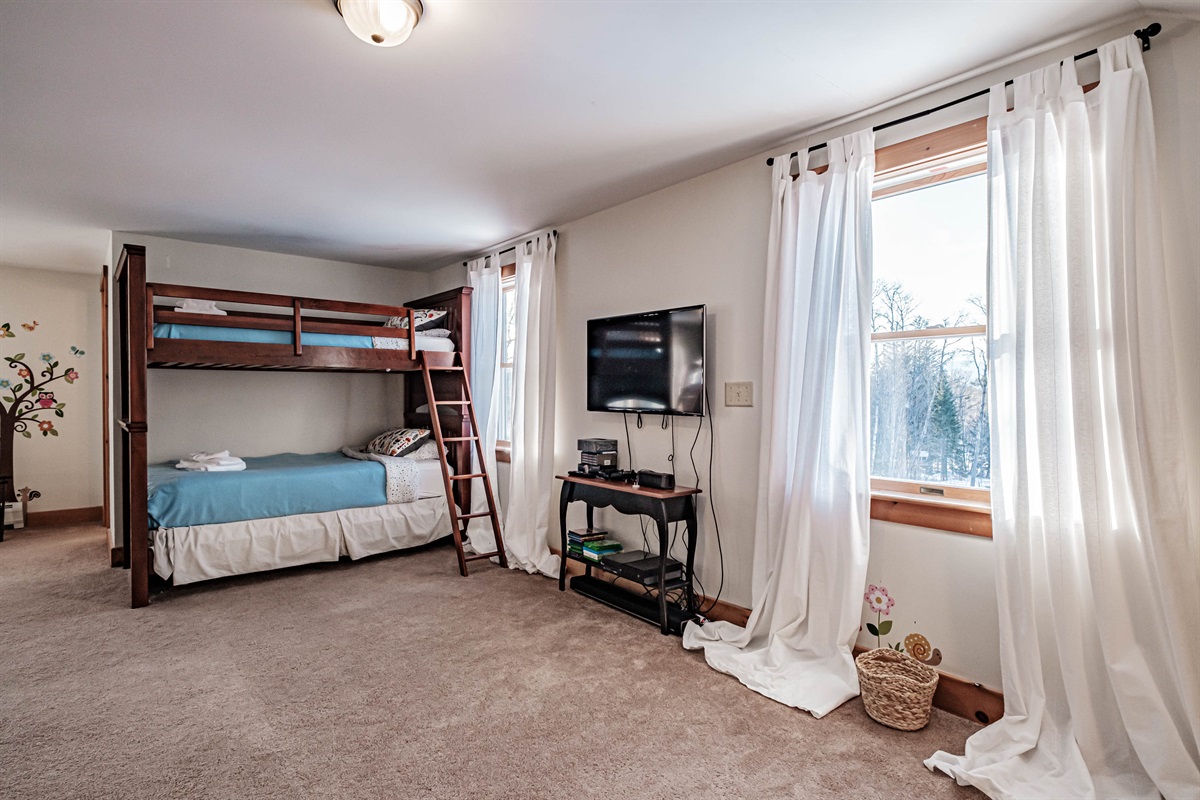 The perfect hangout — a spacious bunk room made for memories.