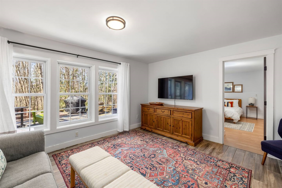 In-law suite: Large windows and privacy curtains. Samsung TV with Hulu Live TV, ESPN+, Disney+