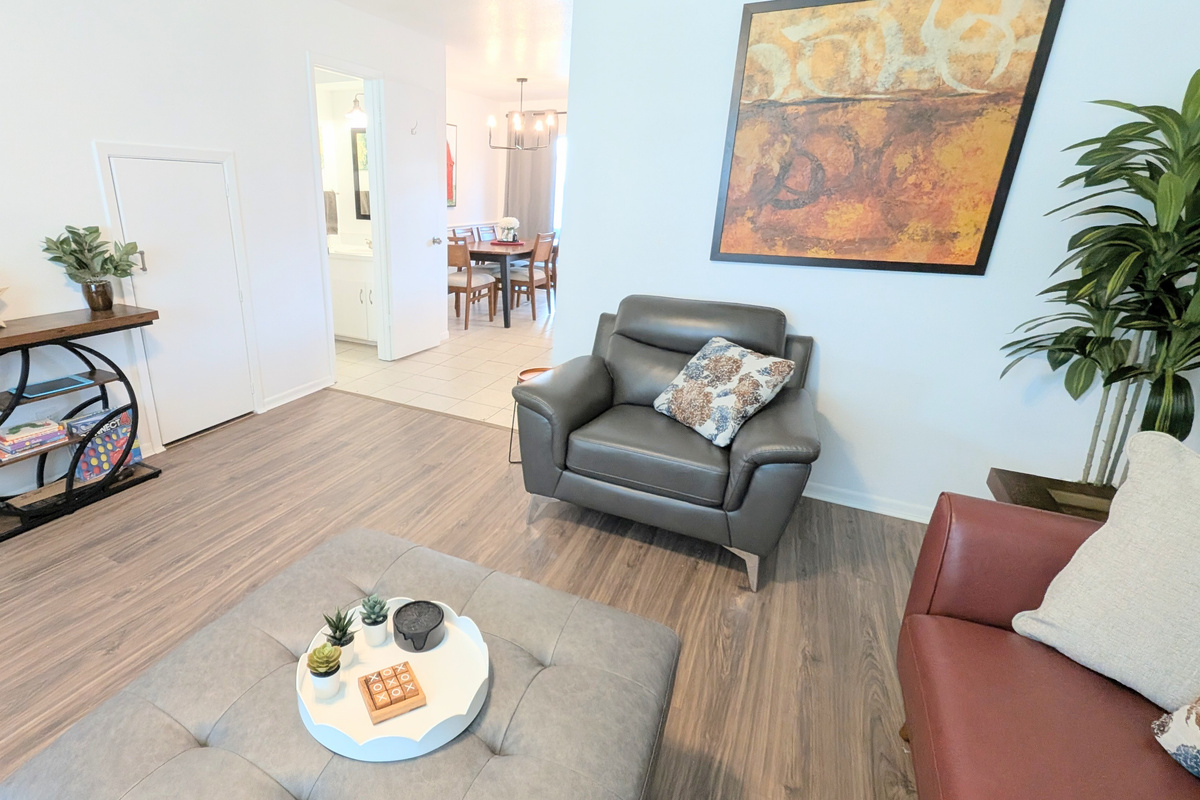 Living room has direct access to the half bath, dining room, and kitchen.