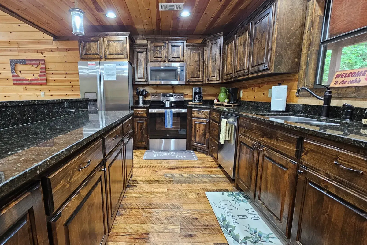 Kitchen: Rustic charm meets modern amenities in this chef's paradise, perfect for family feasts!