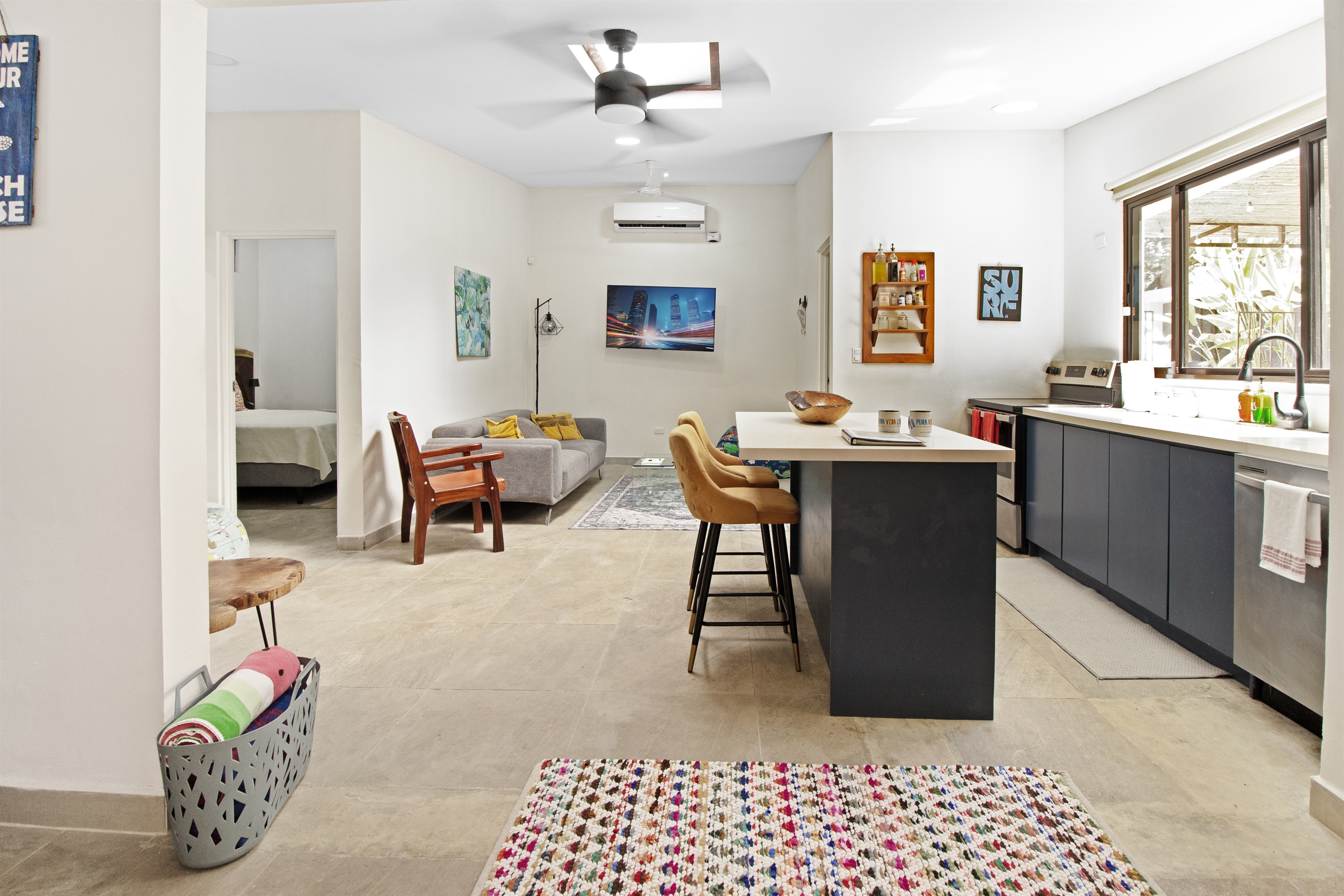 Fully stocked kitchen with stove, dishwasher, microwave. Flatscreen TV in the lounge area