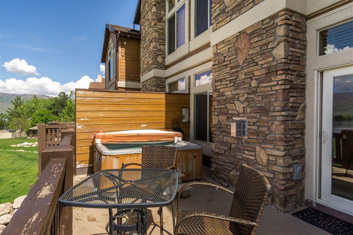 Relax in your private hot tub overlooking the serene landscape—where luxury meets the tranquility of nature.