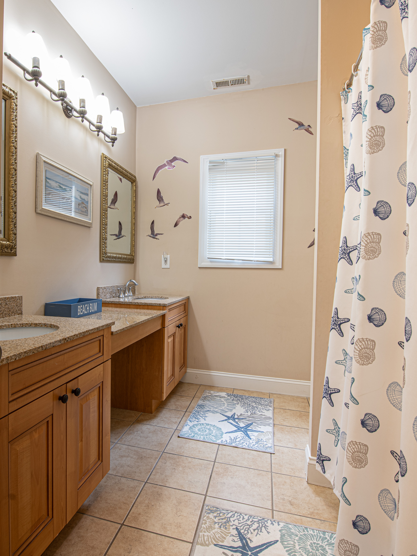 Bathroom 1 with Dual Vanity Counters and Nautical Decor