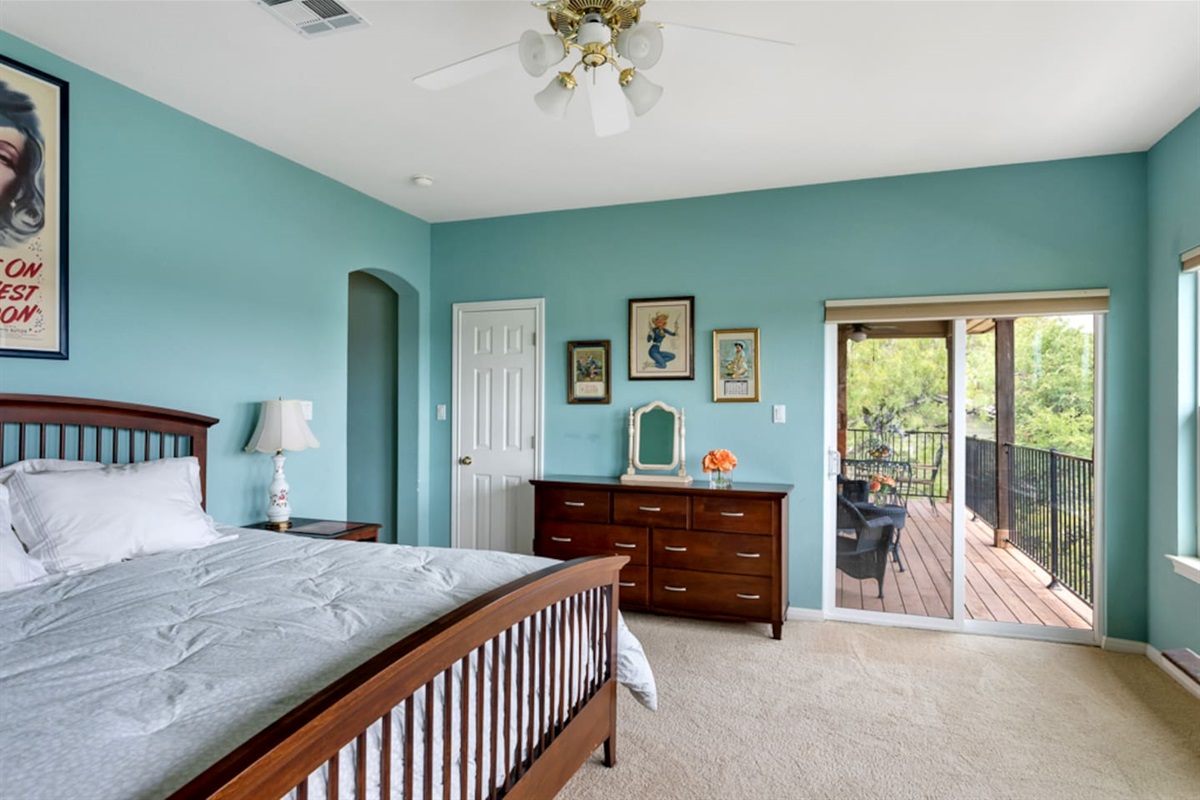 Master bedroom with glass sliding access to porch