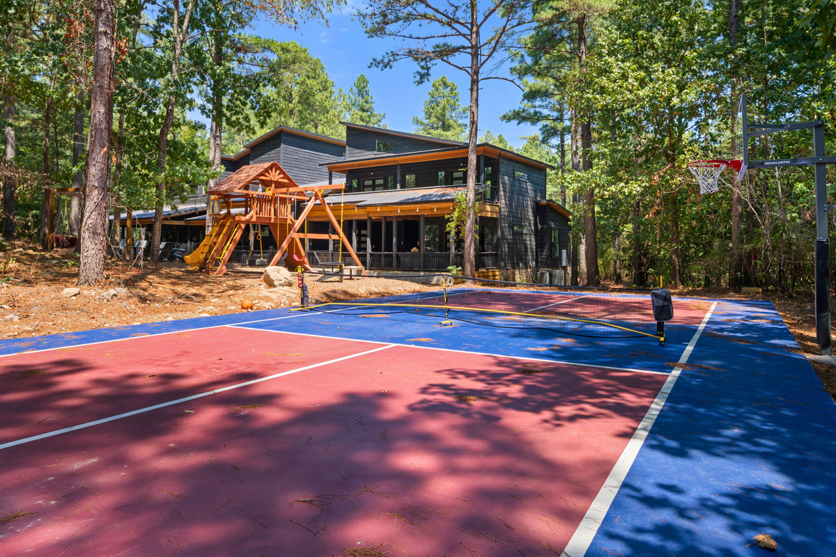Bring a little friendly competition into your getaway with a private sports court tucked among the trees and just steps from the cabin.