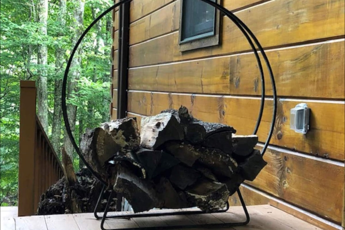 Firewood ring located by entryway door for easy access to firewood.Firewood available for delivery.