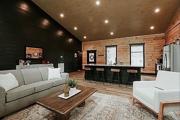 Gather in the bright, open living room where modern touches meet mountain comfort