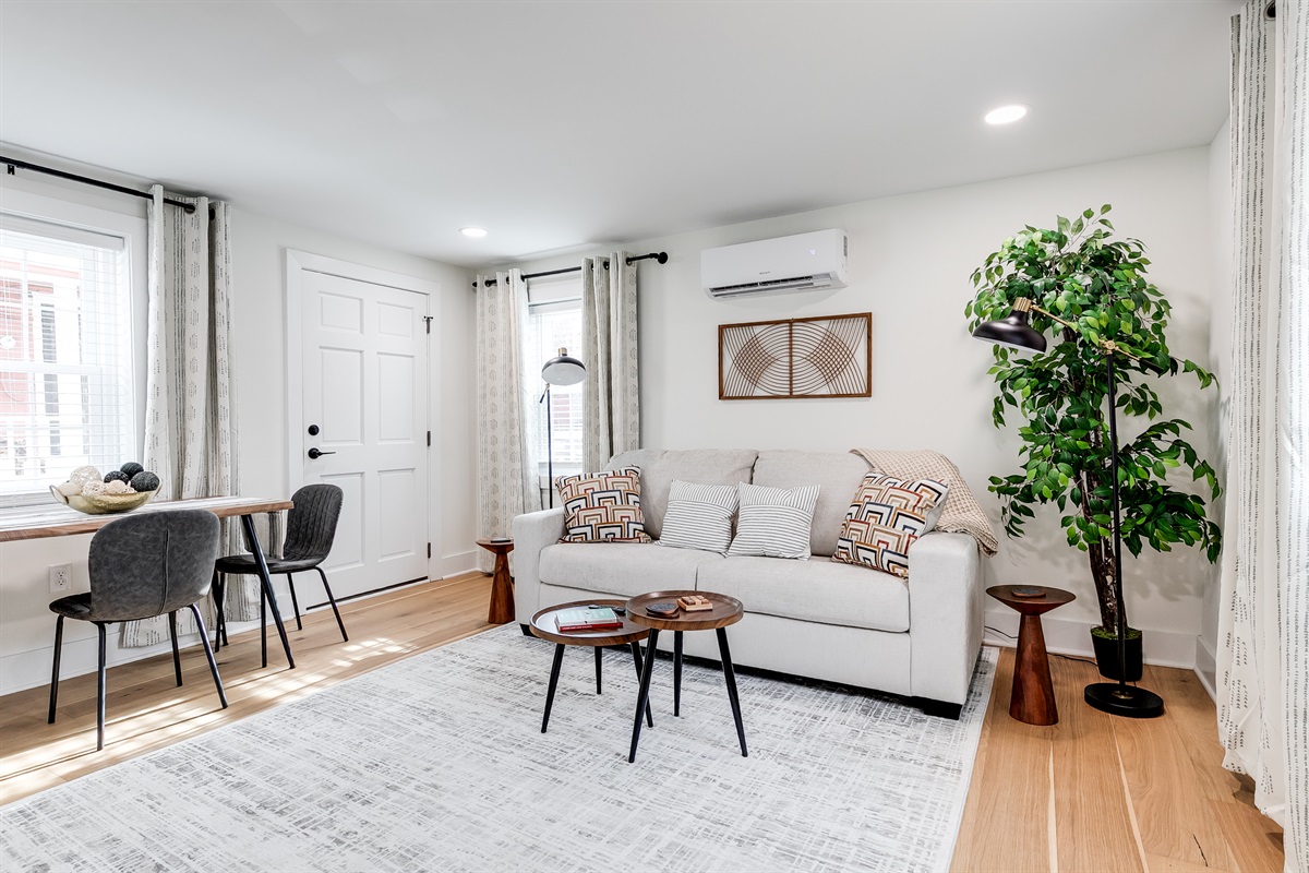 Living Room: Bright and airy space with chic decor, perfect for relaxation or entertaining!