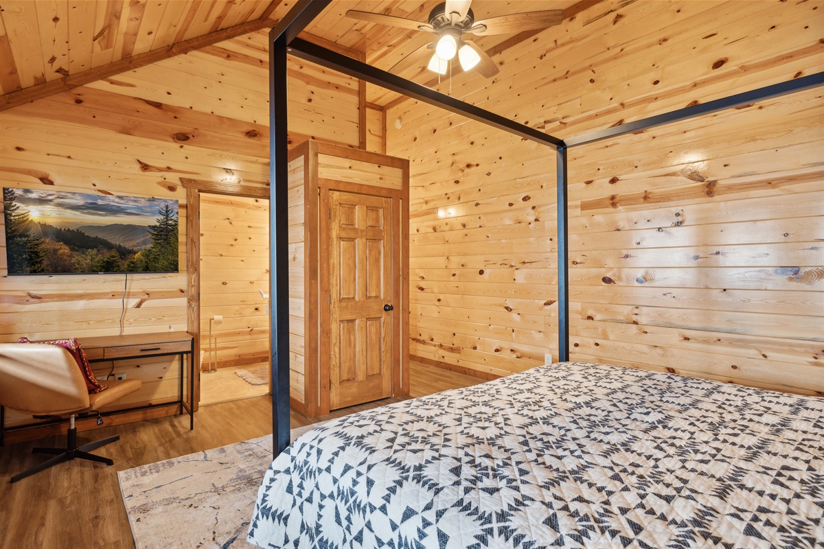 King bedroom with TV and full ensuite bathroom.