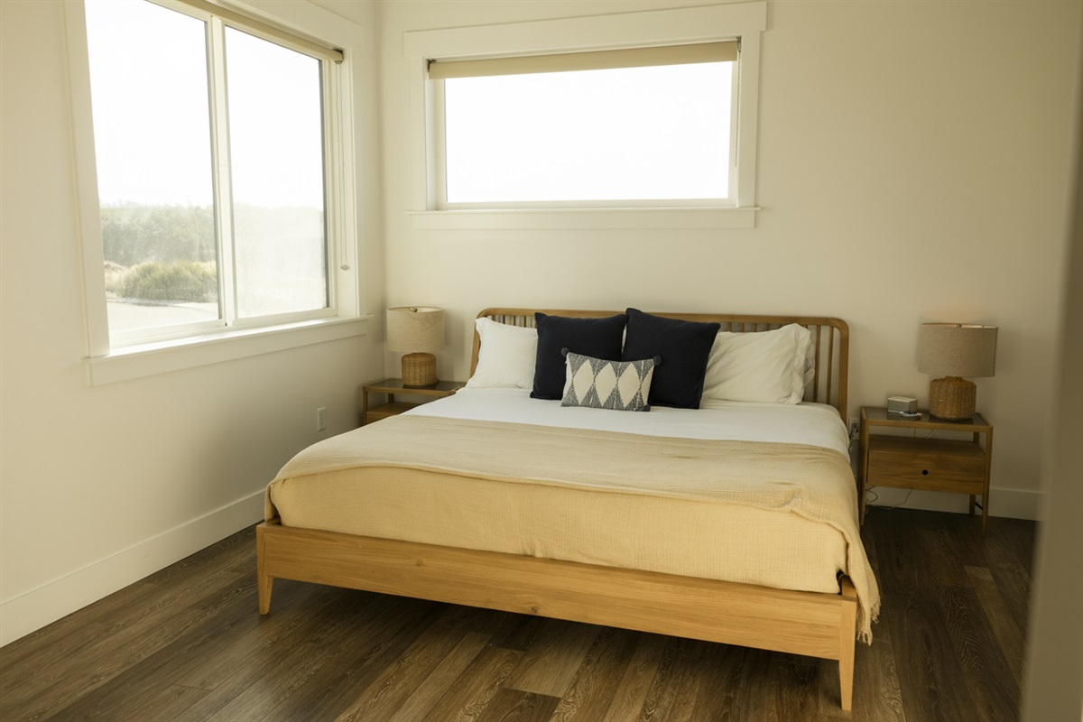 {1st Floor Bedroom} Entry level bedroom with king bed and closet.