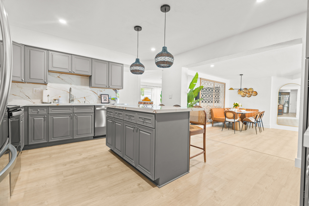 A sleek, fully equipped kitchen ready for your next home-cooked meal