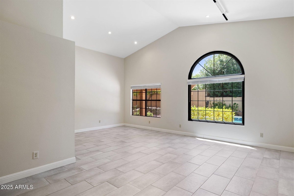 Family Room Opens to Formal Dining Room: Professionally Decorated Now