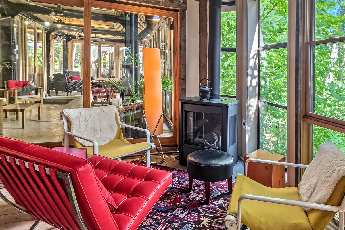 Cozy seating by fire with view of Grand Lake