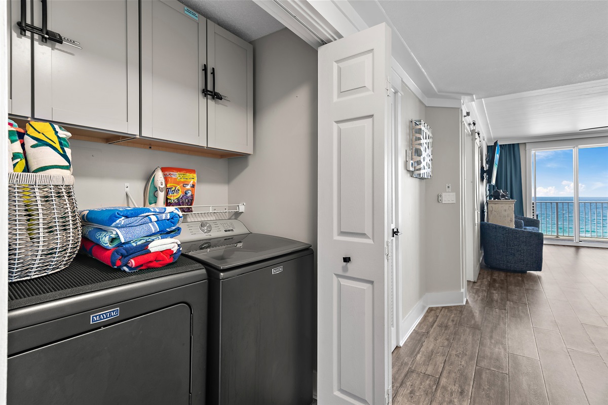 Full-size washer and dryer with plenty of laundry supplies for your stay - and BEACH TOWELS!