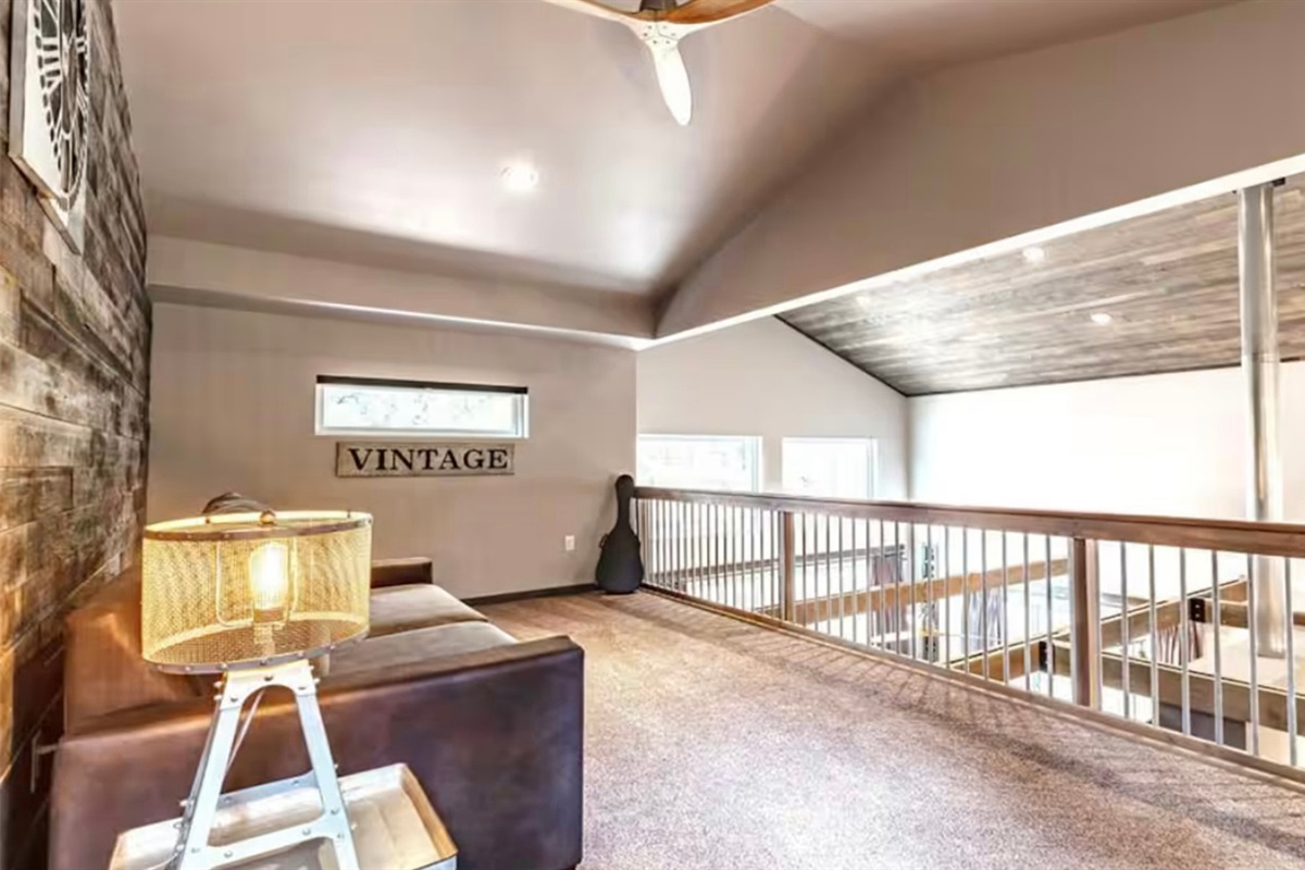 Loft seating area overlooking the great room below.