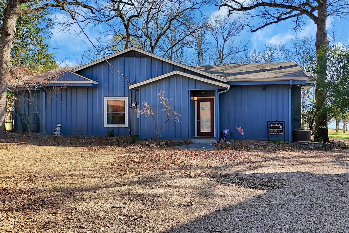 Another exterior view of the home—peaceful, tucked in, and surrounded by nature.