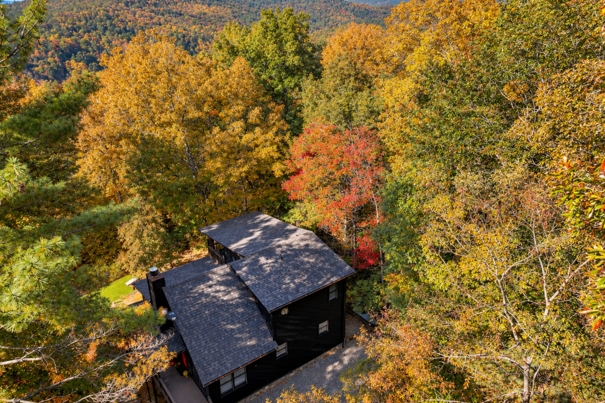 From above, Enchanted Hideaway reveals her charm... nestled among trees, private and serene.