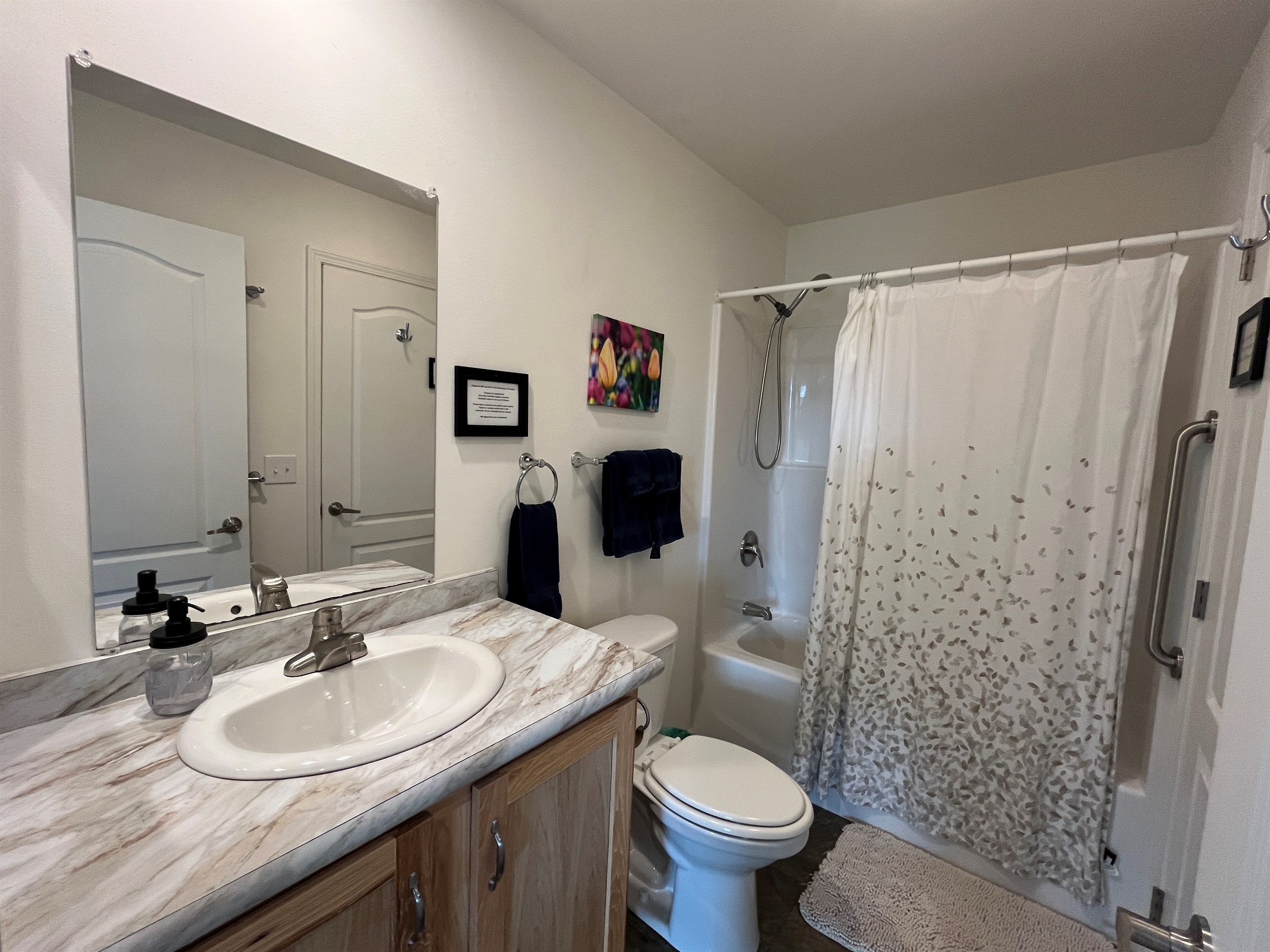 Main level bathroom off hallway