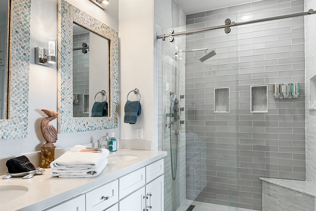Enjoy a double vanity and a rainfall shower.