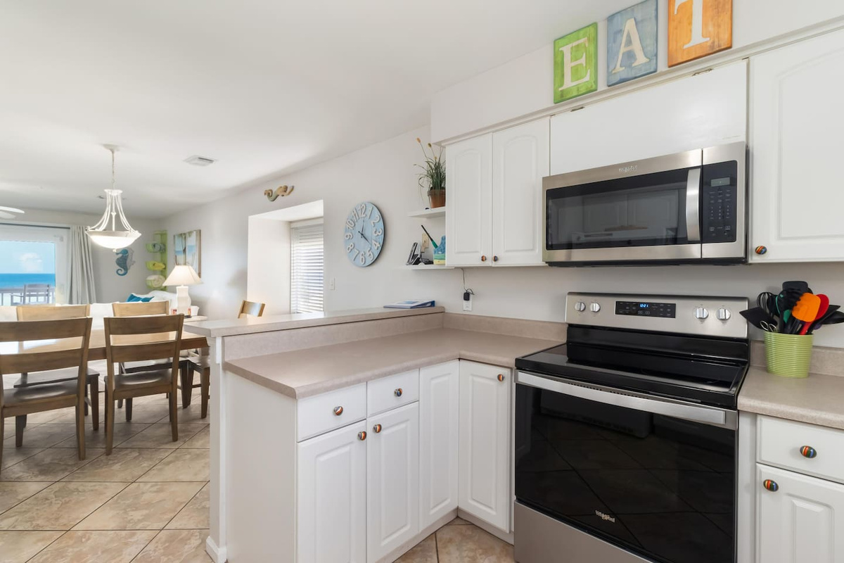 Use every new stainless appliance in this fully equipped kitchen &mdash; real cooking happens here, not just reheating.