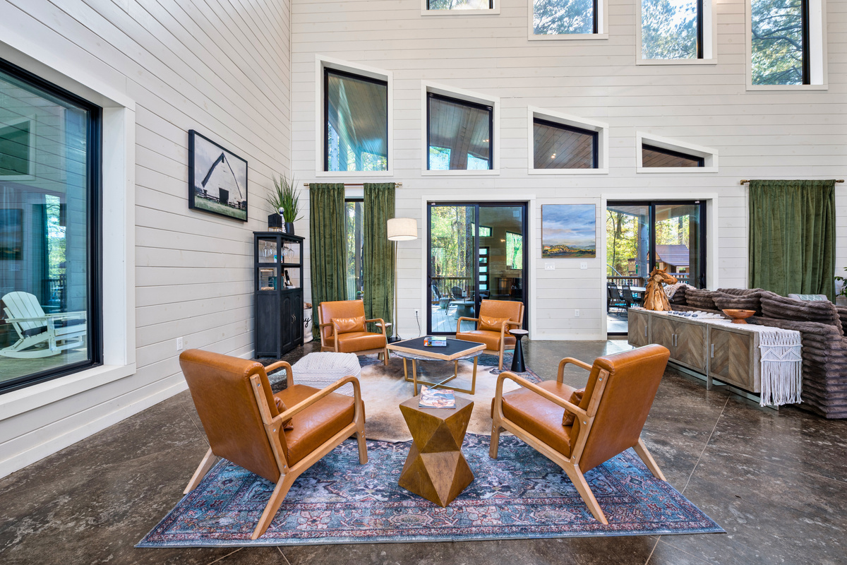 Settle into one of the cozy chairs with a good book or simply enjoy the peaceful views that fill this beautiful living area.