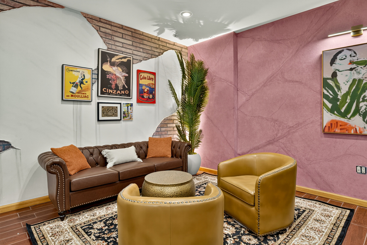 Lounge area with leather seating and accent wall