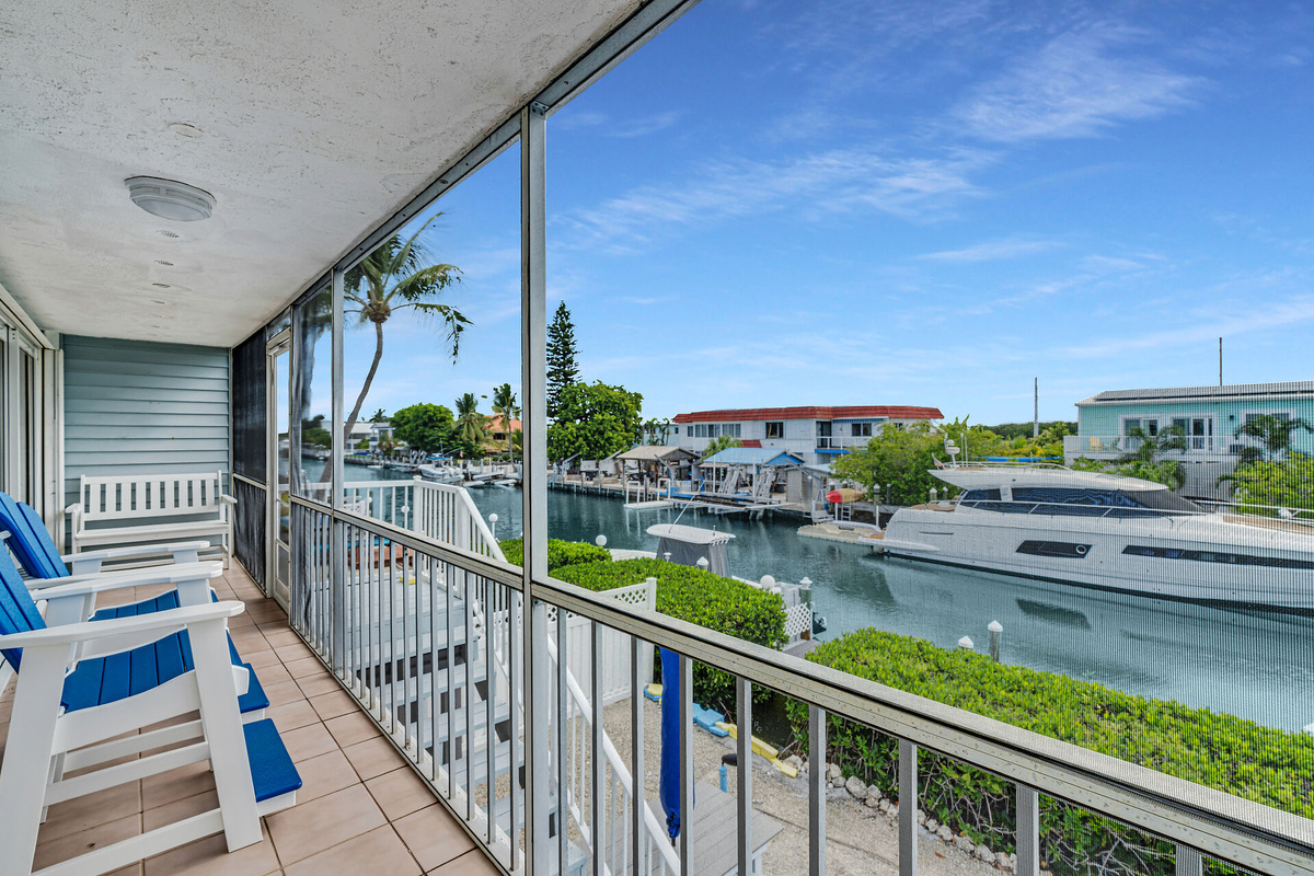 Screened-in patio to watch the dolphins swim by