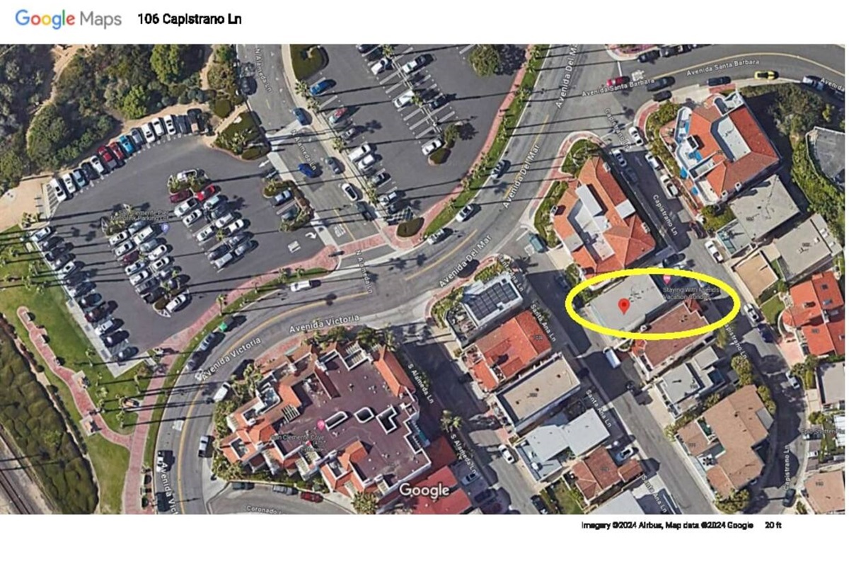 This photo shows the green areas where guests walk their dogs.  The Condos are located at 106 Capistrano Ln.  San Clemente, CA  92672 shown by yellow oval.