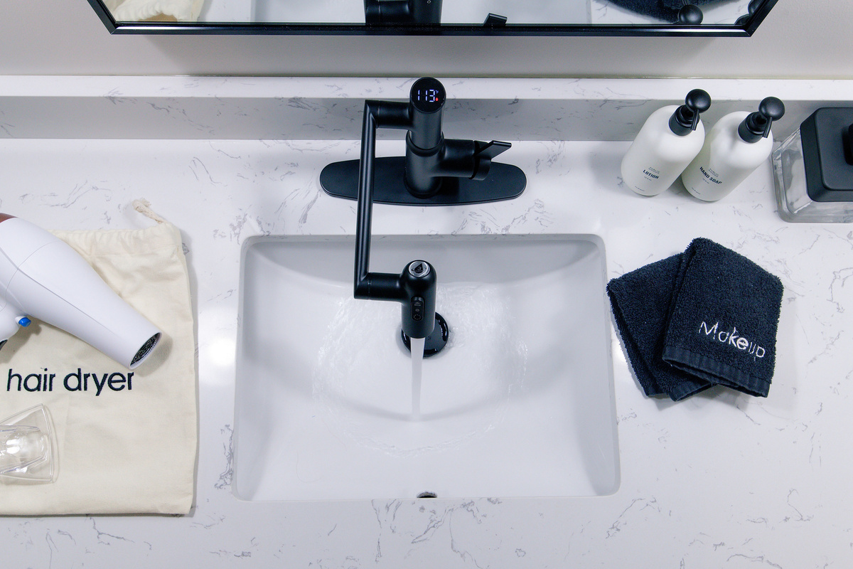 A little obsessed with the faucet in our new bathroom!