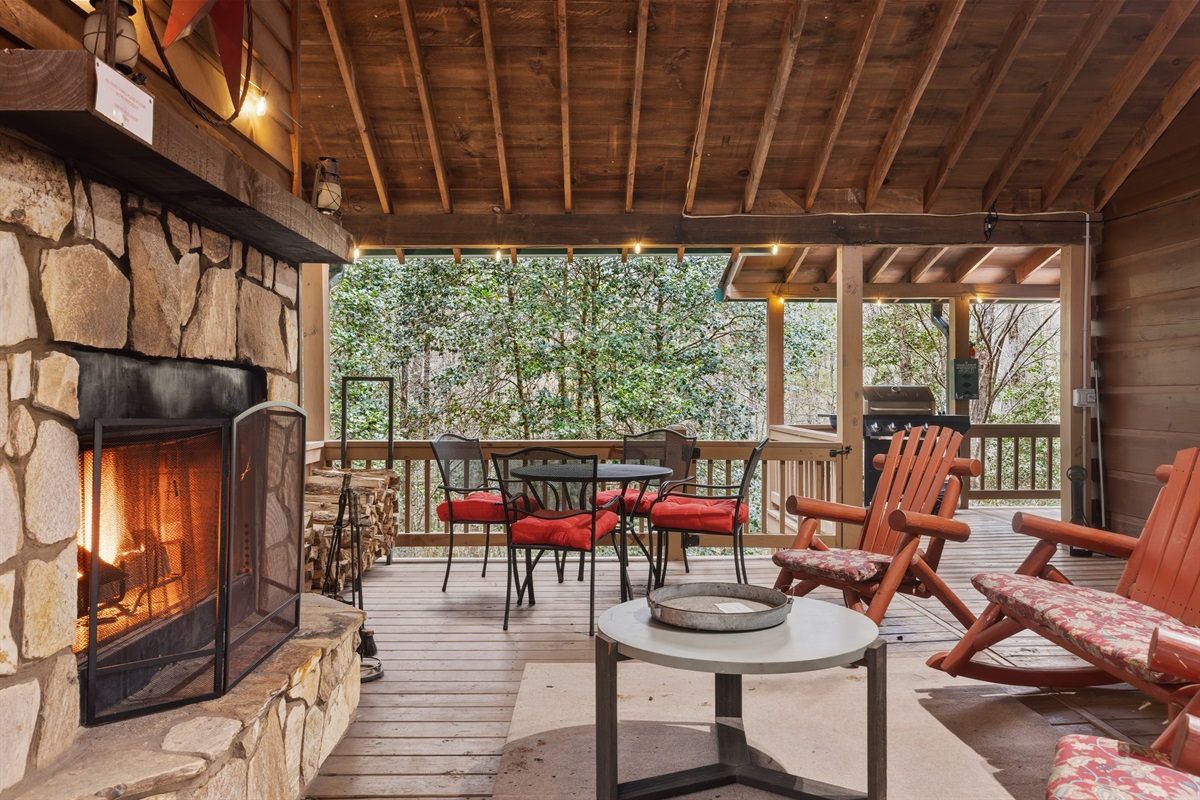 Wood-burning fireplace, loungers and outdoor dining area