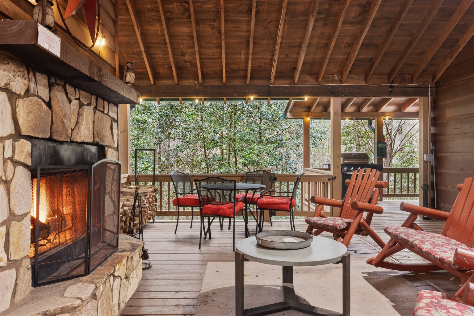 Wood-burning fireplace, loungers and outdoor dining area