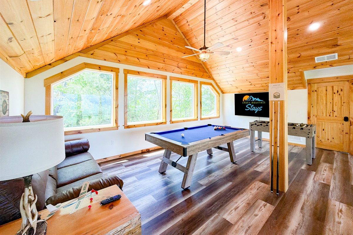 The loft features Pool Table, Foosball Table, additional games, and a 75" Roku TV.