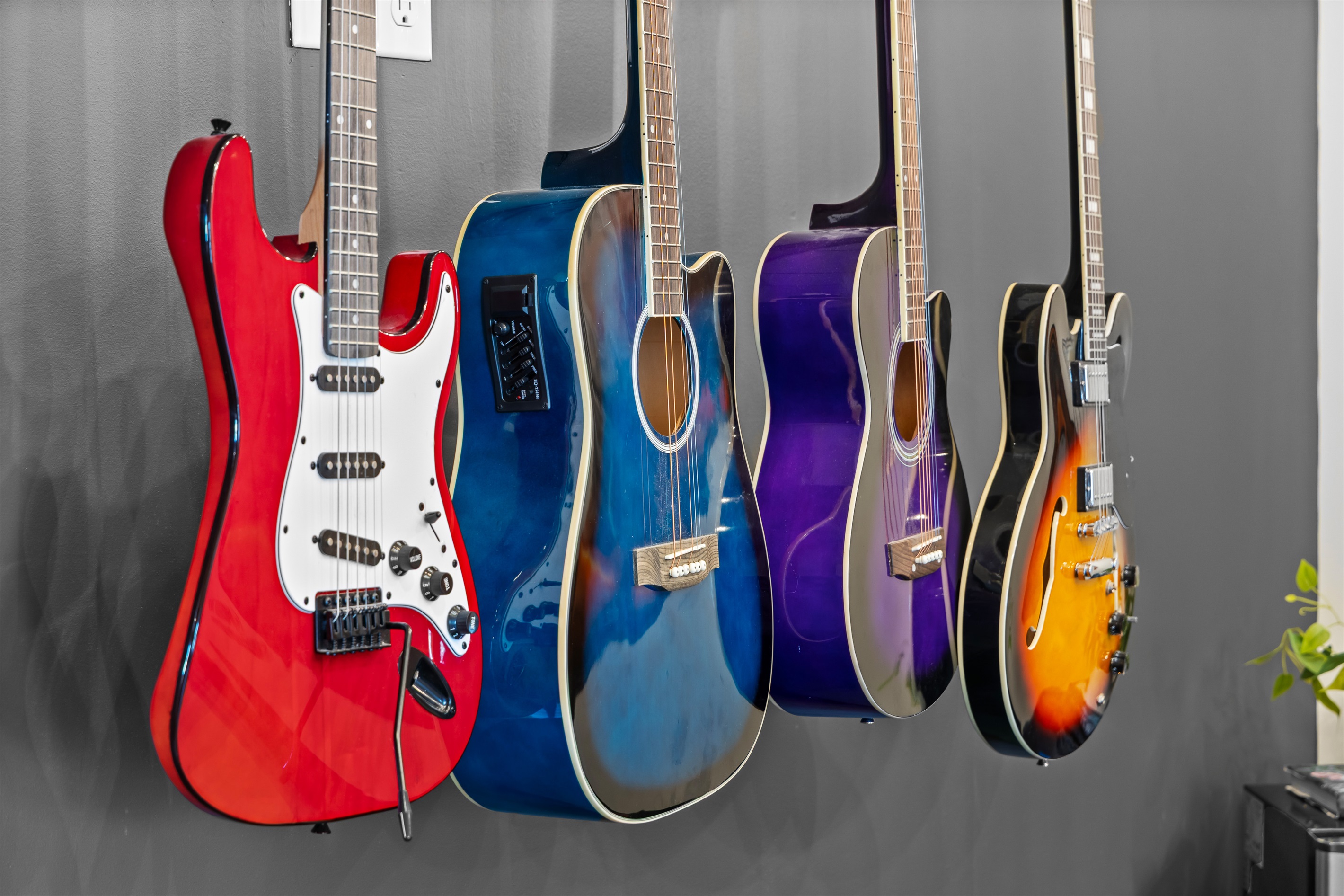 Musical Haven: Jam out with a stunning display of vibrant guitars, perfect for inspiration!