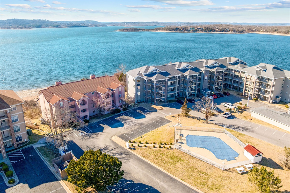 Community pool and grounds overlooking the lake.