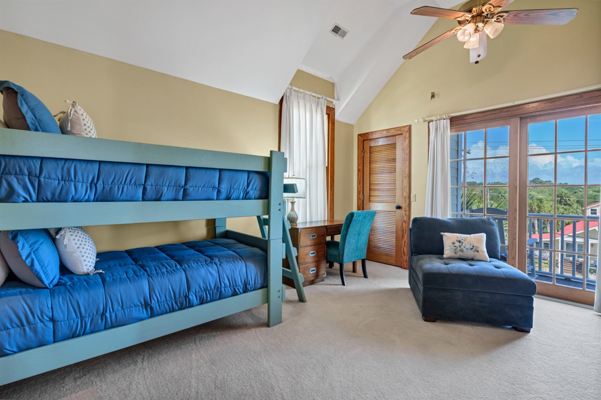Bunk Bed and Seating Area in Guest Bedroom 6 Upstairs, also has a Private Balcony.